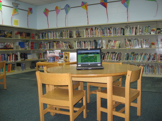 library-table-with-laptop