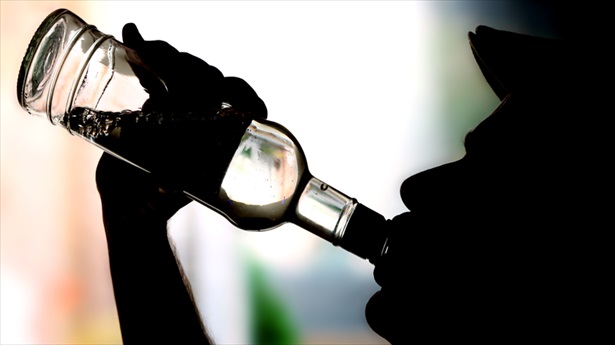 Silhouette-Of-Man-Drinking-Alcohol-Shutterstock